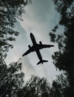 A plane flying over Luton