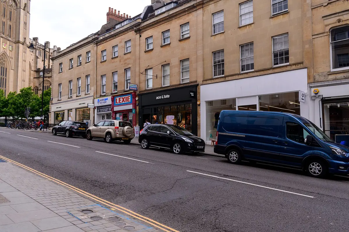 Shopfronts climbing Park Street, Bristol