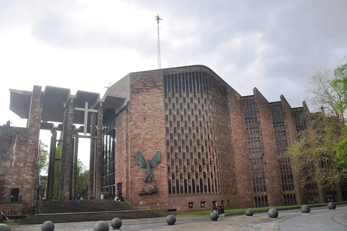 The 1950s Coventry Cathedral beside the ruins of the old one