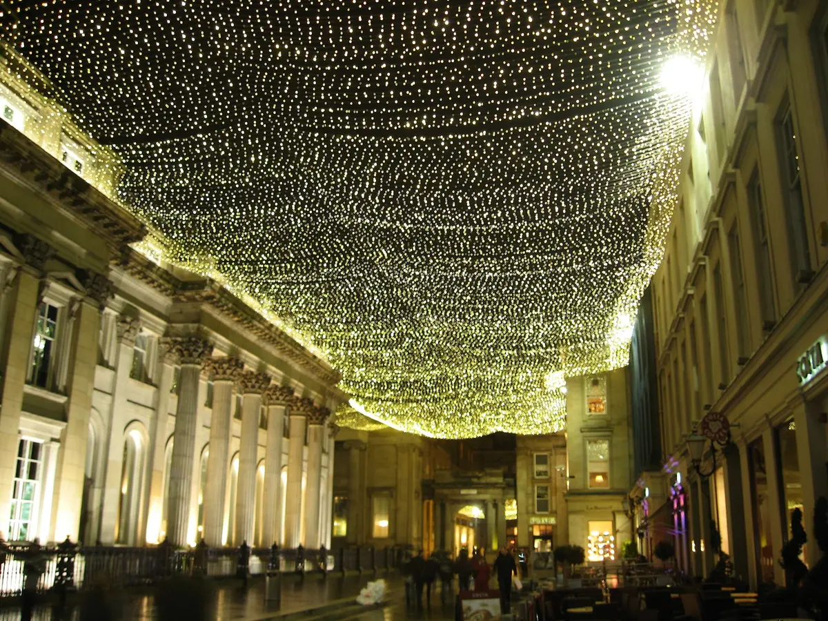 Lights strung over a street in the Merchant City