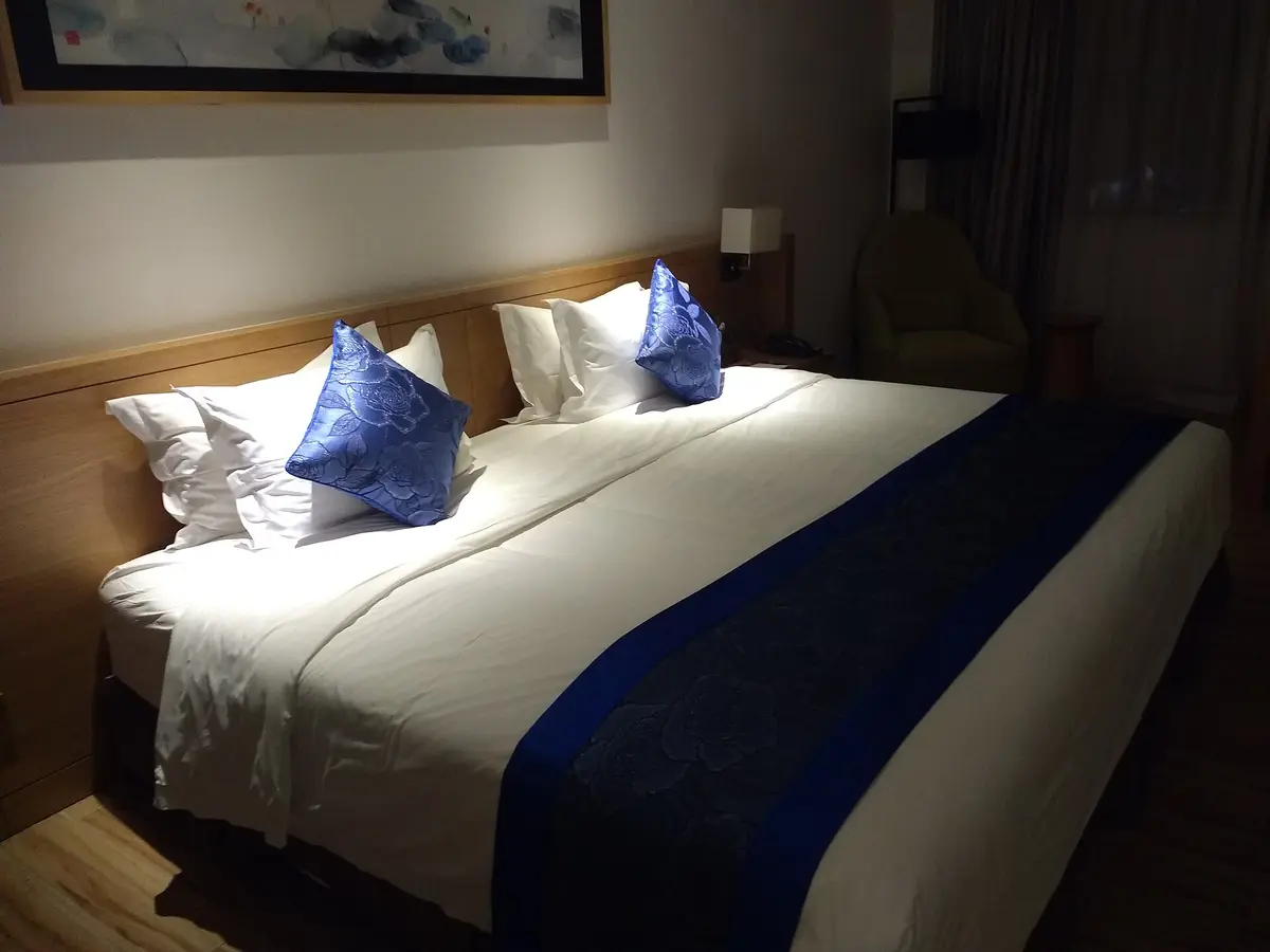 Crisp white hotel bedding