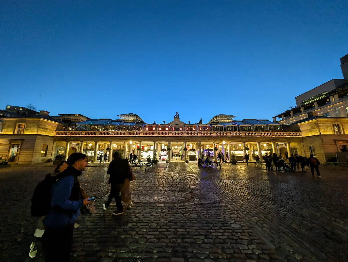 The Covent Garden piazza and market building at dusk