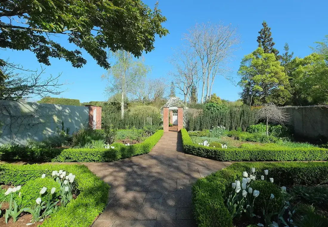 A walled flower garden in spring